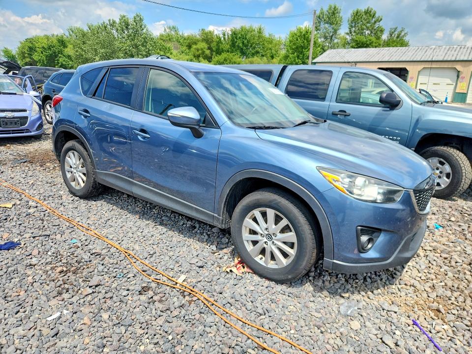 2015 Mazda VIN JM3KE4CY7F0514138 COPART salvage auction — SIDE, Il - Certificate Of Title, sold $2,900 on 2026-07-13 (photo 4)