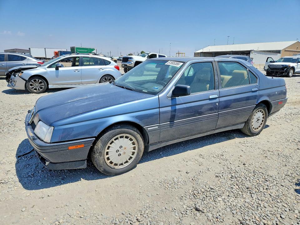 1991 Alfa romeo 164 VIN ZAREA43L5M6186854 COPART salvage auction — FRONT END, CO - DIS/DLR/EXP ONLY CLEAN TITLE, sold $275 on 2026-08-06 (photo 1)