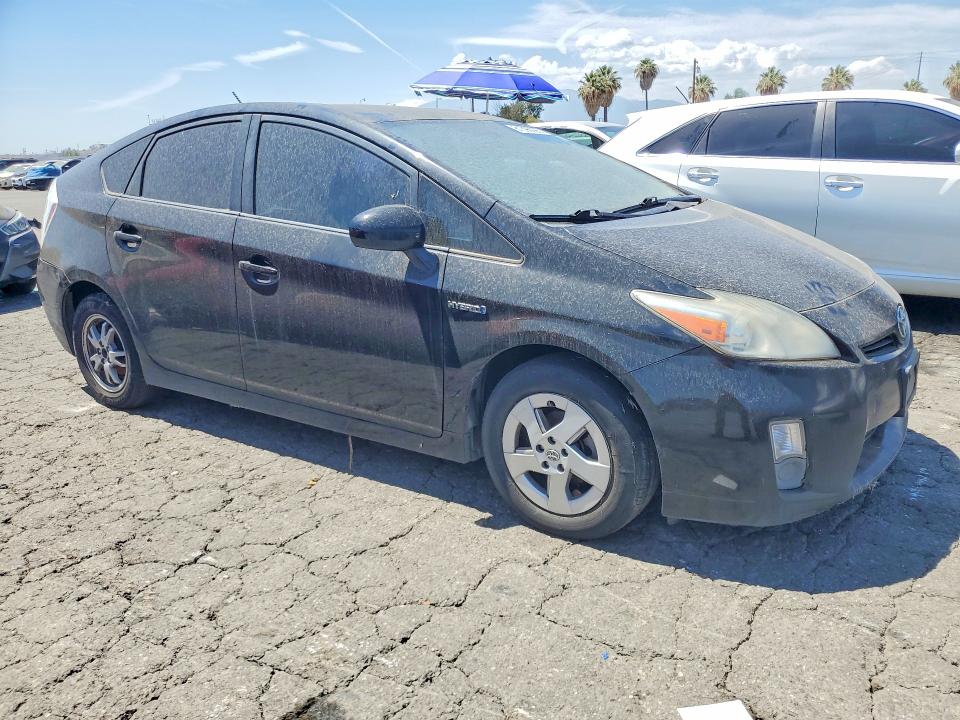 2011 Toyota Prius VIN JTDKN3DUXB0262300 COPART salvage auction — MINOR DENT/SCRATCHES, CA - DIS/DLR/EXP ONLY CLEAN TITLE, sold $875 on 2026-07-20 (photo 4)