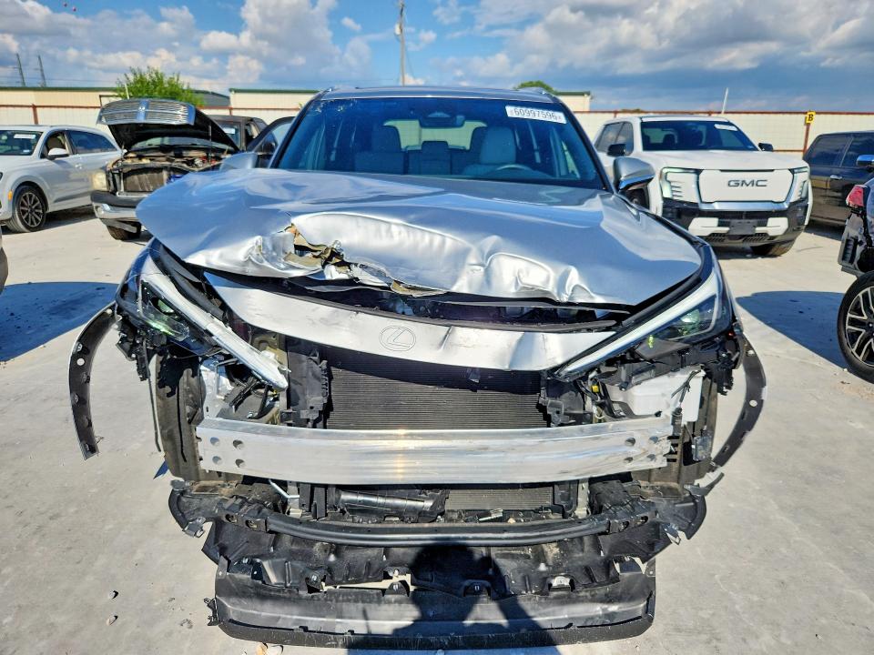 2025 Lexus Tx VIN 5TDAAAA64SS017295 COPART salvage auction — FRONT END, TX - SALVAGE VEHICLE TITLE, sold $19,800 on 2026-08-28 (photo 5)