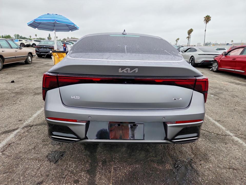 2026 Kia K5 VIN KNAG64J77T5402621 COPART salvage auction — FRONT END, CA - SALVAGE CERTIFICATE, sold $11,500 on 2026-08-21 (photo 6)