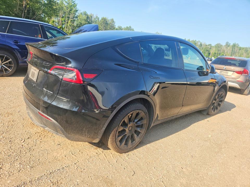 2023 Tesla Model y VIN LRWYGDEE0PC105007 COPART salvage auction — FRONT END, ON - PERMIT NO BRAND - UNFIT, sold $16,950 on 2026-08-18 (photo 3)