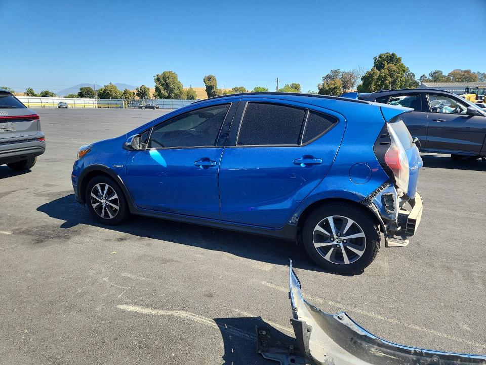 2018 Toyota Prius c VIN JTDKDTB37J1606591 COPART salvage auction — REAR END, Ca - Salvage Certificate, sold $90 on 2026-07-29 (photo 2)
