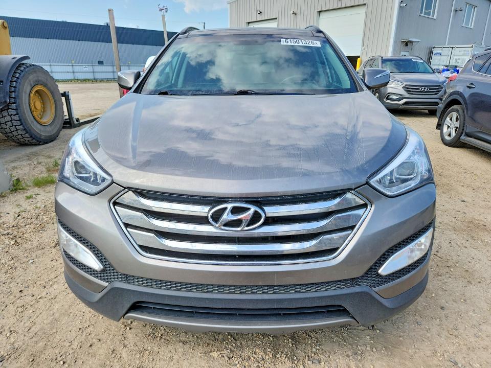 2014 Hyundai Santa fe VIN 5XYZUDLA9EG215384 COPART salvage auction — MECHANICAL, Salvage Title, sold $2,200 on 2026-07-23 (photo 5)
