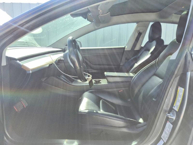 2018 Tesla Model 3 VIN 5YJ3E1EB7JF185035 COPART salvage auction — NORMAL WEAR, Fl - Certificate Of Title, sold $10,900 on 2026-07-28 (photo 7)