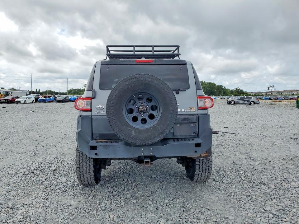2013 Toyota Fj cruiser VIN JTEBU4BF8DK156105 COPART salvage auction — FRONT END, FL - CERT OF TITLE SLVG REBUILDABLE, sold $5,200 on 2026-08-18 (photo 6)
