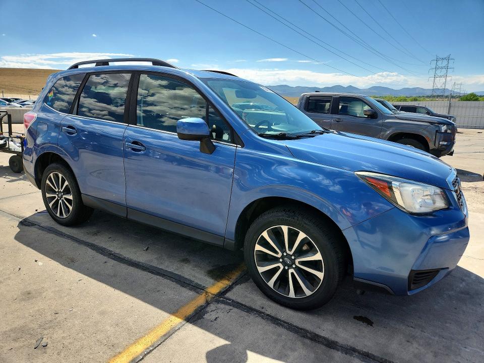 2017 Subaru Forester VIN JF2SJGEC5HH800390 COPART salvage auction — HAIL, CO - CERTIFICATE OF TITLE, sold $4,000 on 2026-08-19 (photo 4)