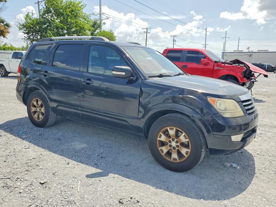 2009 Kia Borrego VIN KNDJJ741295033515 COPART salvage auction — REAR END, Fl - Cert Of Title Slvg Rebuildable, sold $10 on 2026-07-28 (photo 4)