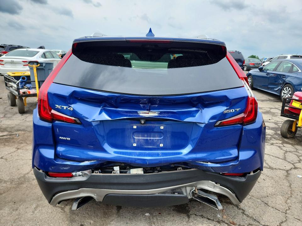 2021 Cadillac Xt4 VIN 1GYFZDR46MF000028 COPART salvage auction — REAR END, Pa - Certificate Of Salvage, sold $8,400 on 2026-08-07 (photo 6)