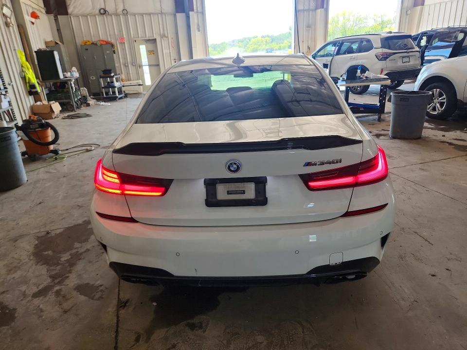 2021 BMW M340i VIN 3MW5U9J0XM8B61011 COPART salvage auction — MINOR DENT/SCRATCHES, MI - CERTIFICATE OF TITLE, sold $19,500 on 2026-08-27 (photo 6)