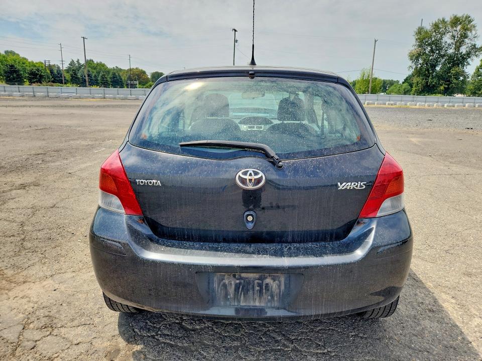 2011 Toyota Yaris VIN JTDJT4K38B5334132 COPART salvage auction — MECHANICAL, OR - NON PUBLIC CLEAN TITLE, sold $150 on 2026-07-22 (photo 6)