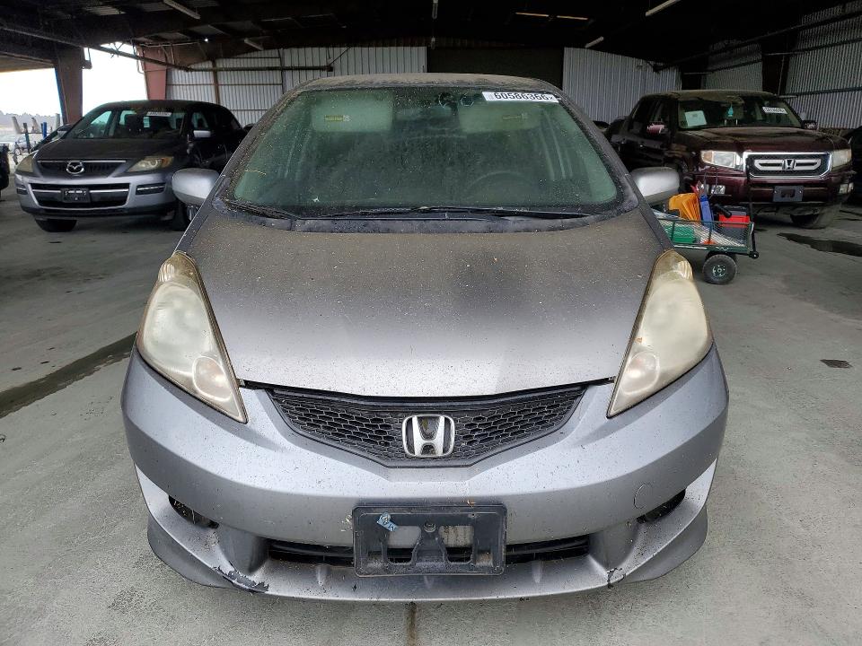 2010 Honda Fit VIN JHMGE8H64AS025804 COPART salvage auction — SIDE, MA - DIS/DLR/EXP ONLY CLEAN TITLE, sold $1,050 on 2026-07-13 (photo 5)