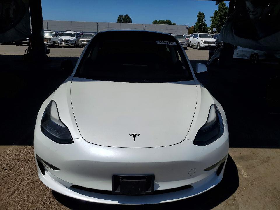 2023 Tesla Model 3 VIN 5YJ3E1EA5PF580153 COPART salvage auction — MINOR DENT/SCRATCHES, CA - CERTIFICATE OF TITLE (P), sold $15,200 on 2026-07-20 (photo 5)
