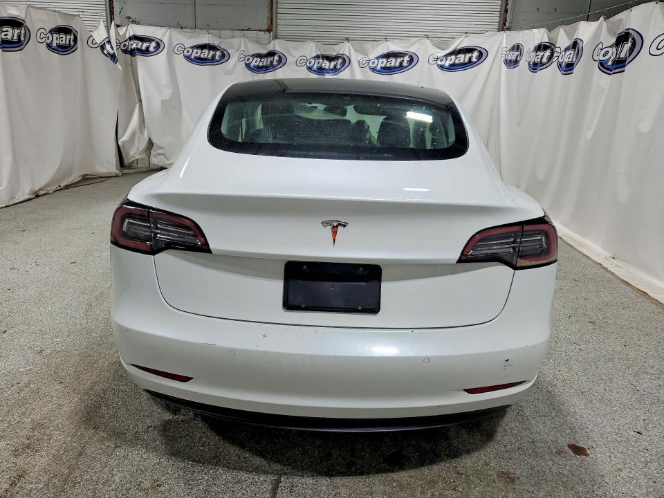 2022 Tesla Model 3 VIN 5YJ3E1EA5NF285535 COPART salvage auction — FRONT END, Fl - Certificate Of Title, sold $8,900 on 2026-07-27 (photo 6)