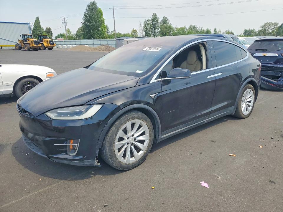 2017 Tesla Model x VIN 5YJXCBE2XHF049392 — COPART salvage auction photo