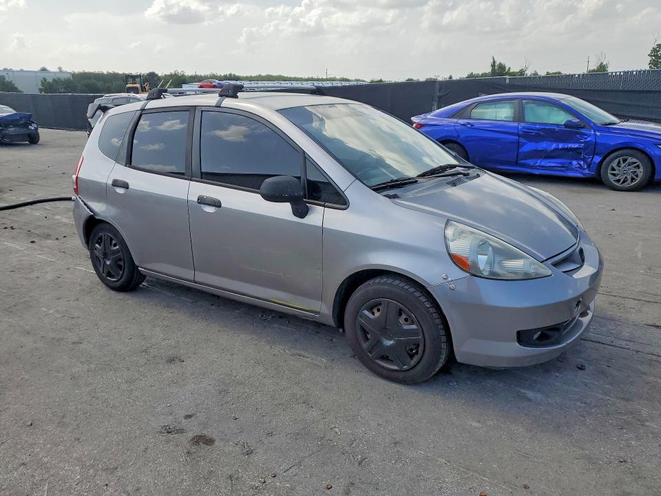 2007 Honda Fit VIN JHMGD38467S026112 COPART salvage auction — REAR END, Fl - Cert Of Title Slvg Rebuildable, sold $375 on 2026-07-28 (photo 4)