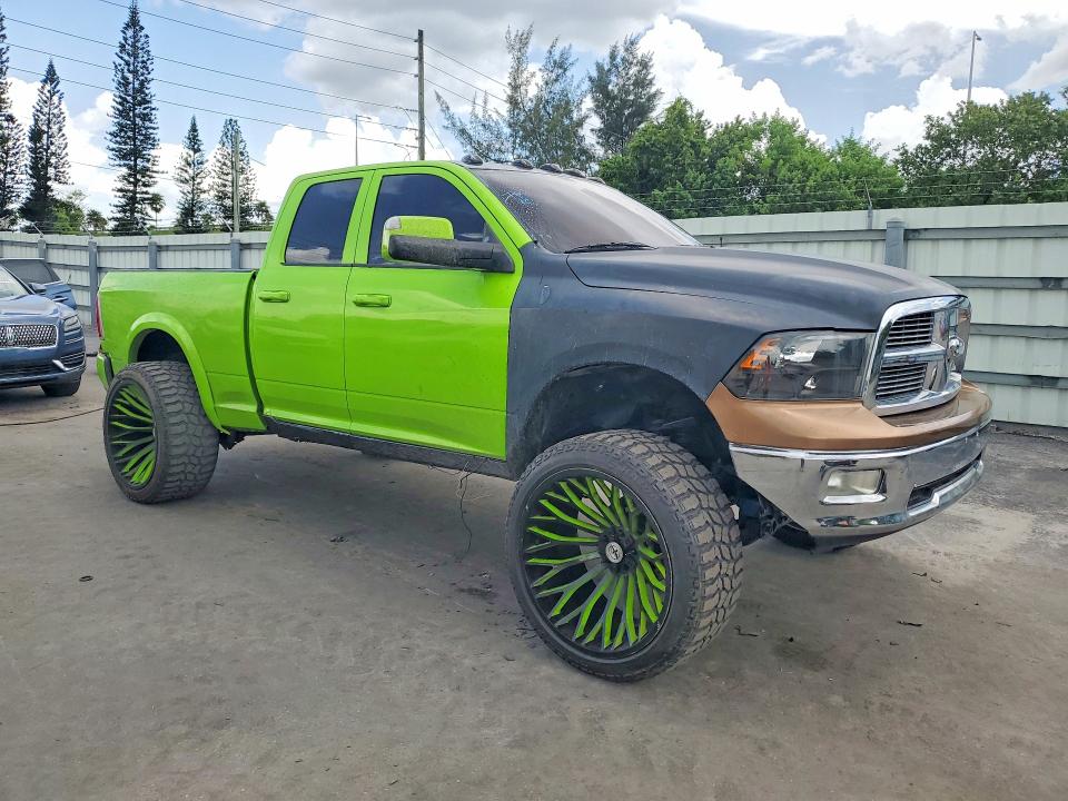2011 Dodge Ram 1500 VIN 1D7RV1GT2BS616617 COPART salvage auction — DAMAGE HISTORY, FL - CERT OF TITLE SLVG REBUILDABLE, sold $2,200 on 2026-07-29 (photo 4)