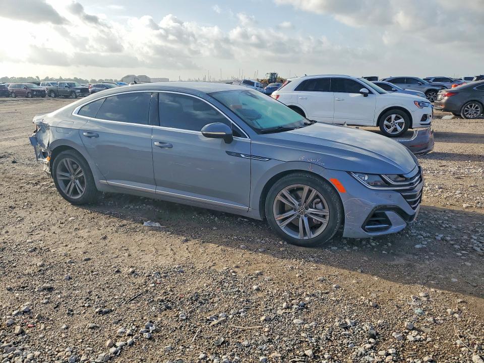 2022 Volkswagen Arteon VIN WVWSR7AN4NE010686 COPART salvage auction — REAR END, TX - SALVAGE VEHICLE TITLE (P), sold $9,700 on 2026-09-08 (photo 4)