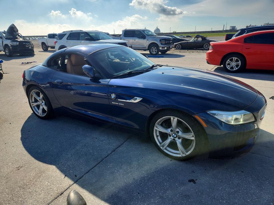 2015 BMW Z4 VIN WBALM7C58FJ798717 COPART salvage auction — WATER/FLOOD, La - Cert Of Title-Salvage Flood, sold $8,300 on 2026-08-12 (photo 4)