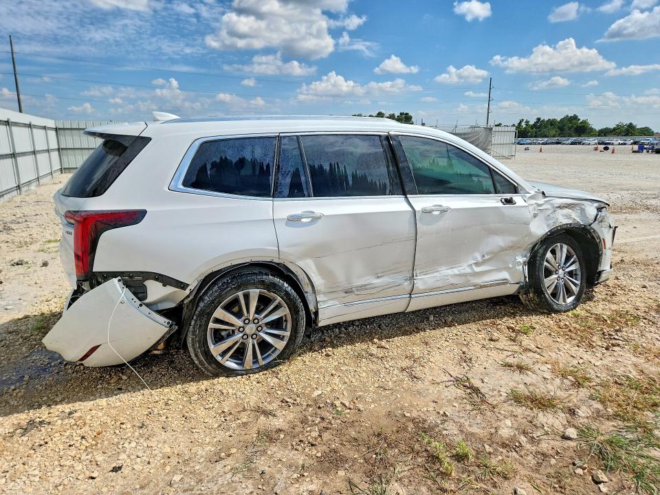 2024 Cadillac Xt6 VIN 1GYKPCRS7RZ719288 COPART salvage auction — SIDE, Tx - Salvage Vehicle Title, sold $2,550 on 2026-07-09 (photo 3)