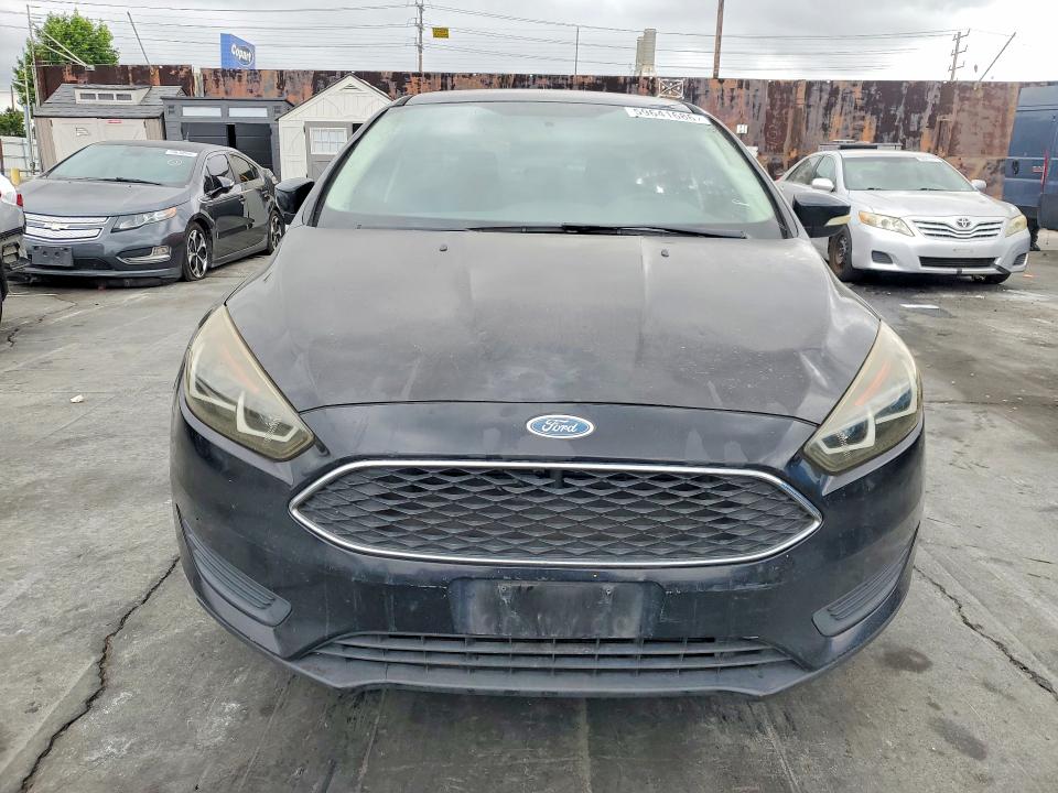 2016 Ford Focus VIN 1FADP3F21GL291243 COPART salvage auction — NORMAL WEAR, Ca - Dis/Dlr/Exp Only Clean Title, sold $375 on 2026-07-10 (photo 5)