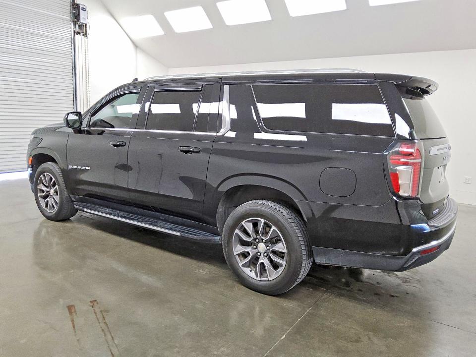 2023 Chevrolet Suburban VIN 1GNSCCKT3PR197820 COPART salvage auction — MINOR DENT/SCRATCHES, TX - CERTIFICATE OF TITLE, sold $25,000 on 2026-08-27 (photo 2)