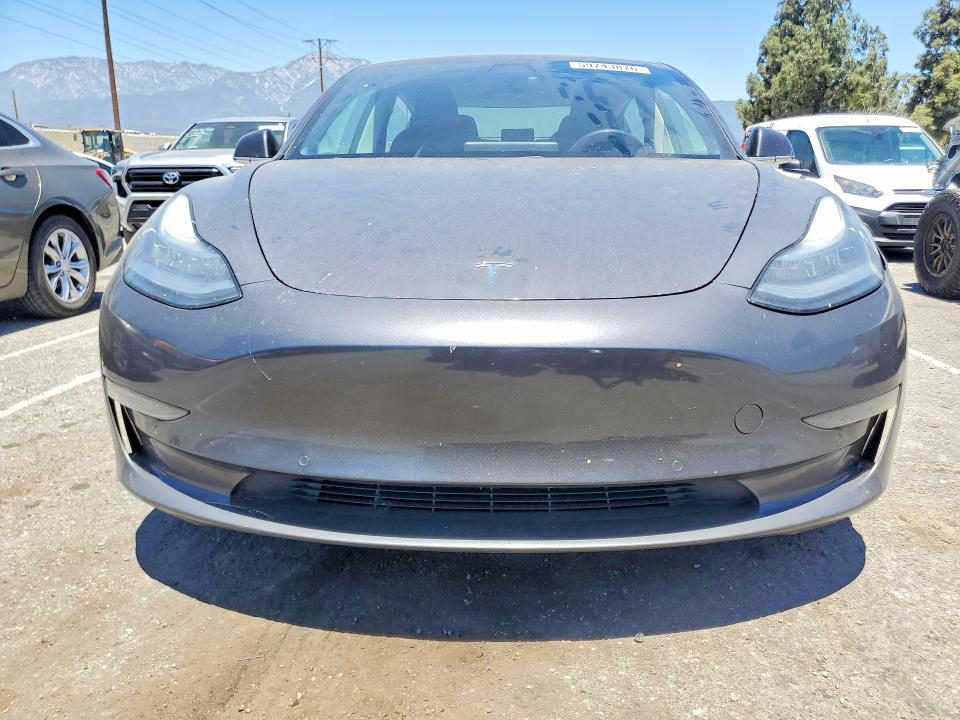2018 Tesla Model 3 VIN 5YJ3E1EAXJF059176 COPART salvage auction — MINOR DENT/SCRATCHES, Ca - Salvage Certificate, sold $5,800 on 2026-07-16 (photo 5)