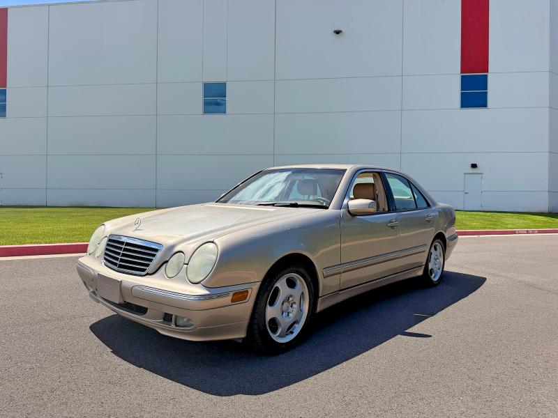 2000 Mercedes-benz E-class VIN WDBJF70J7YB018627 COPART salvage auction — MINOR DENT/SCRATCHES, Or - Certificate Of Title (P), sold $2,700 on 2026-07-20 (photo 2)