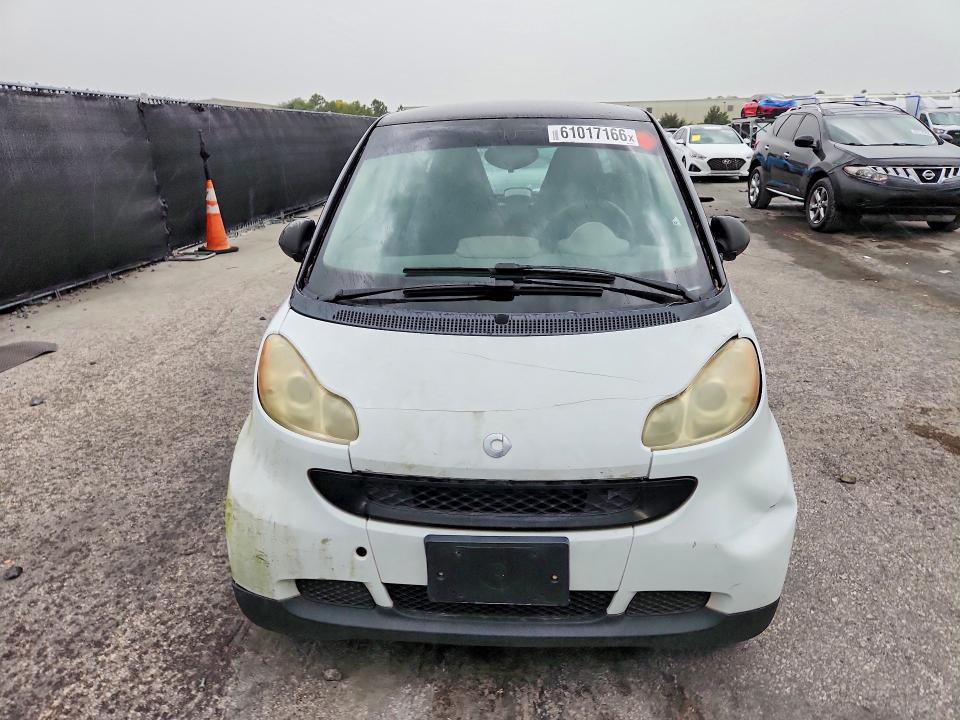 2009 Smart Fortwo VIN WMEEJ31X39K210210 COPART salvage auction — MINOR DENT/SCRATCHES, FL - CERTIFICATE OF TITLE (P), sold $900 on 2026-07-23 (photo 5)