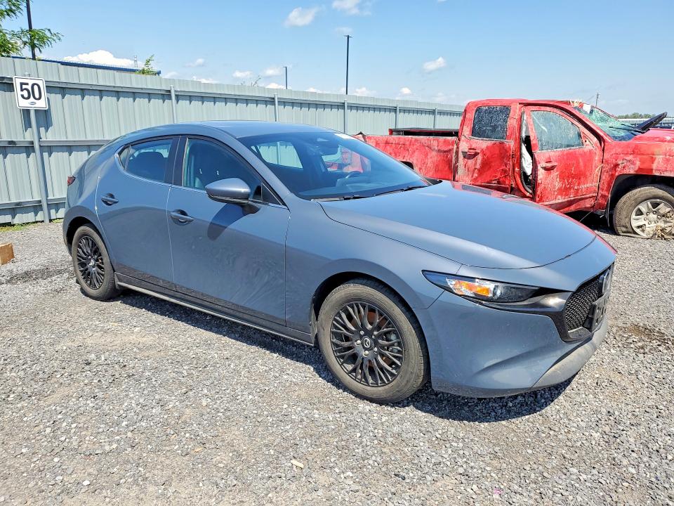 2025 Mazda 3 VIN JM1BPBLM1S1750311 COPART salvage auction — WATER/FLOOD, ON - PERMIT IRREPAIRABLE, sold $250 on 2026-07-23 (photo 4)