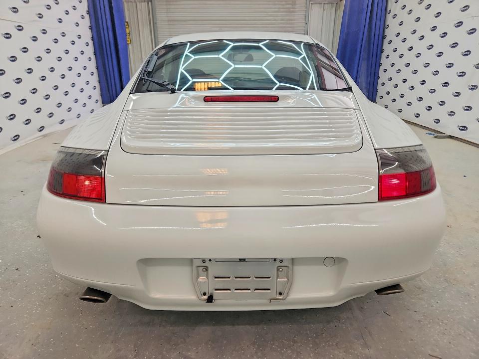 1999 Porsche 911 VIN WP0ZZZ99ZXS603275 COPART salvage auction — MINOR DENT/SCRATCHES, Tx - Certificate Of Title, sold $7,700 on 2026-08-04 (photo 6)