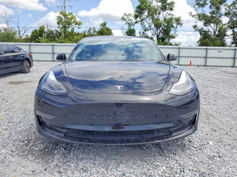 2023 Tesla Model 3 VIN 5YJ3E1EA9PF691269 COPART salvage auction — REAR END, Fl - Certificate Of Destruction, sold $5,100 on 2026-07-28 (photo 5)