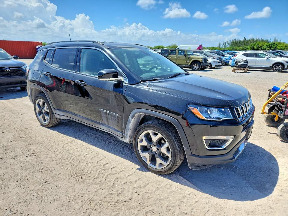 2019 Jeep Compass VIN 3C4NJDCB5KT767002 COPART salvage auction — MINOR DENT/SCRATCHES, FL - CERT OF TITLE-SLVG REBLD FLOOD, sold $2,050 on 2026-08-05 (photo 4)