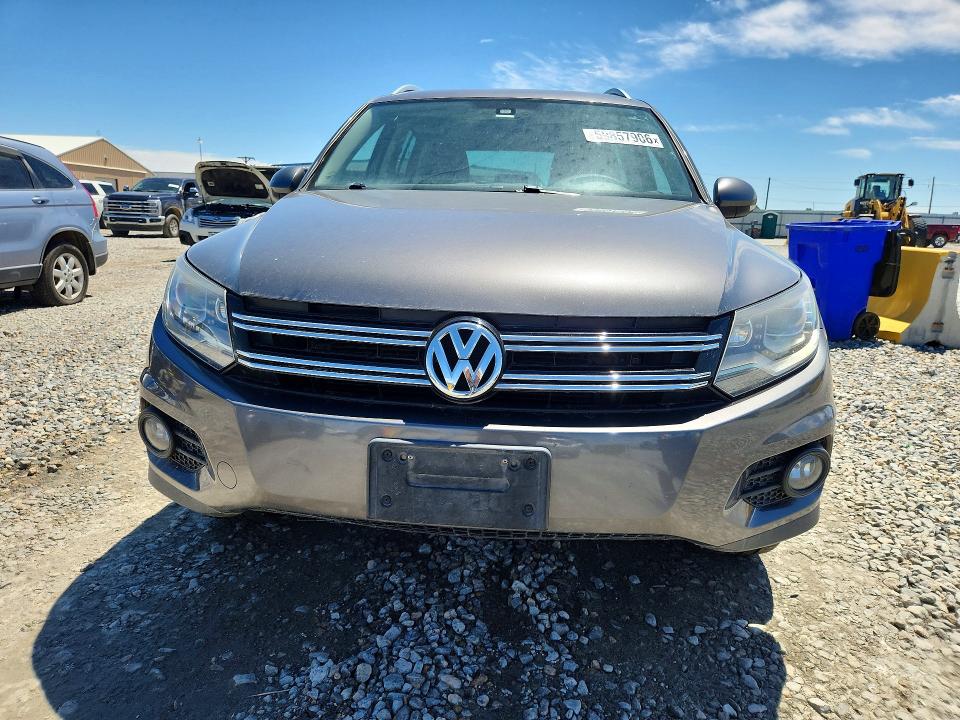2016 Volkswagen Tiguan VIN WVGBV7AX1GW563124 COPART salvage auction — SIDE, CO - DIS/DLR/EXP ONLY CLEAN TITLE, sold $1,550 on 2026-07-14 (photo 5)