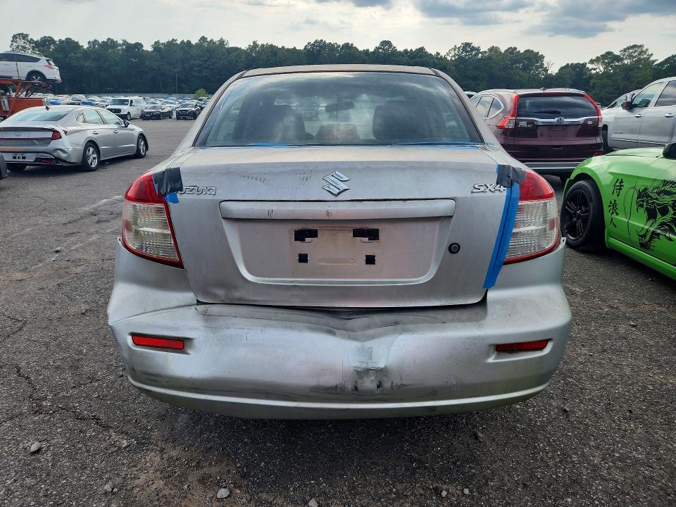 2011 Suzuki Sx4 VIN JS2YC5A26B6300770 COPART salvage auction — MINOR DENT/SCRATCHES, Al - Cert Of Title-Salvage Title, sold $225 on 2026-09-28 (photo 6)