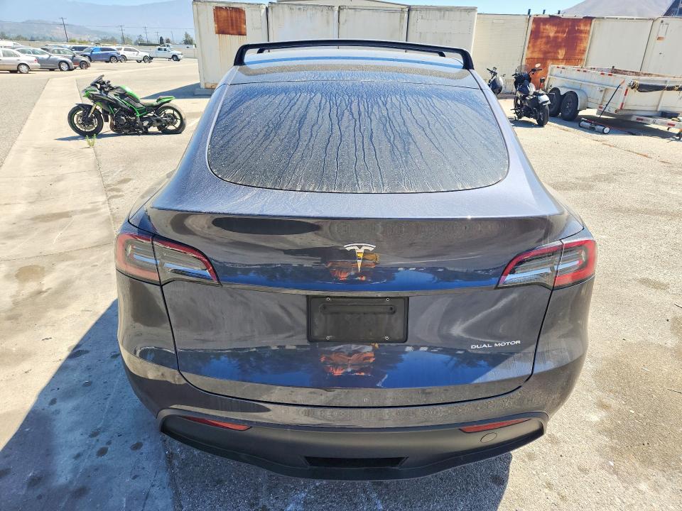 2023 Tesla Model y VIN 7SAYGDEEXPF928052 COPART salvage auction — SIDE, Salvage Title, sold $14,500 on 2026-07-28 (photo 6)
