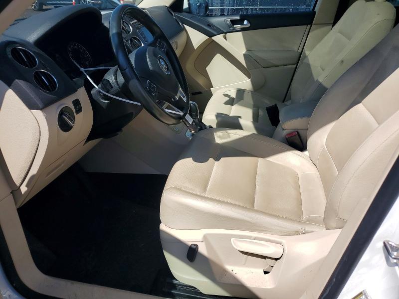 2014 Volkswagen Tiguan VIN WVGBV3AX2EW523382 COPART salvage auction — MINOR DENT/SCRATCHES, Ct - Certificate Of Title, sold $800 on 2026-07-28 (photo 7)