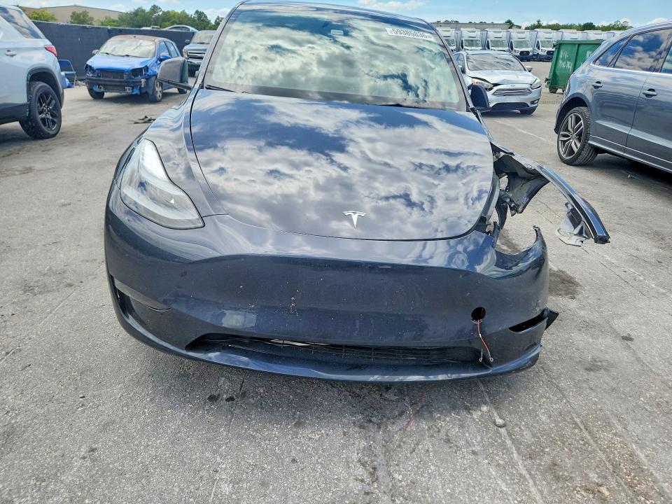 2024 Tesla Model y VIN 7SAYGDED5RF161043 COPART salvage auction — UNDERCARRIAGE, Fl - Certificate Of Title, sold $9,700 on 2026-07-21 (photo 5)