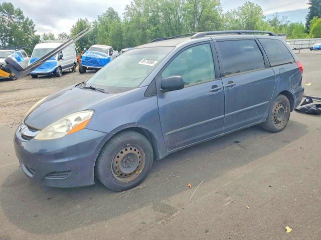 2010 Toyota Sienna VIN 5TDKK4CC9AS305950 COPART salvage auction — REAR END, WA - CERT OF OWNERSHIP-REBUILT, sold $1,500 on 2026-07-15 (photo 1)