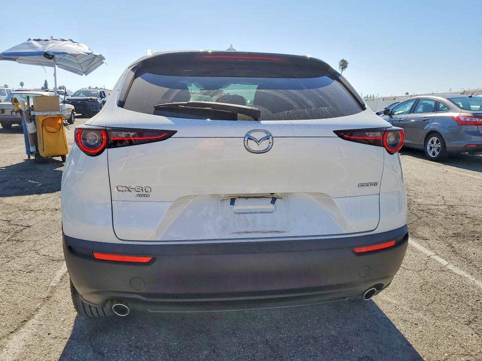 2023 Mazda Cx-30 VIN 3MVDMBDM0PM556863 COPART salvage auction — SIDE, Ca - Salvage Certificate, sold $8,100 on 2026-08-28 (photo 6)