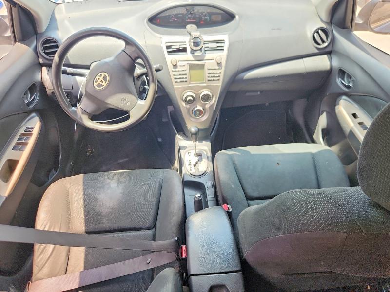 2010 Toyota Yaris VIN JTDBT4K38A1397225 COPART salvage auction — FRONT END, TX - SALVAGE VEHICLE TITLE, sold $175 on 2026-07-21 (photo 8)