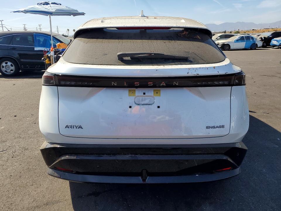 2024 Nissan Ariya VIN JN1AF0BA4RM436545 COPART salvage auction — SIDE, Ca - Salvage Certificate, sold $10,100 on 2026-08-24 (photo 6)