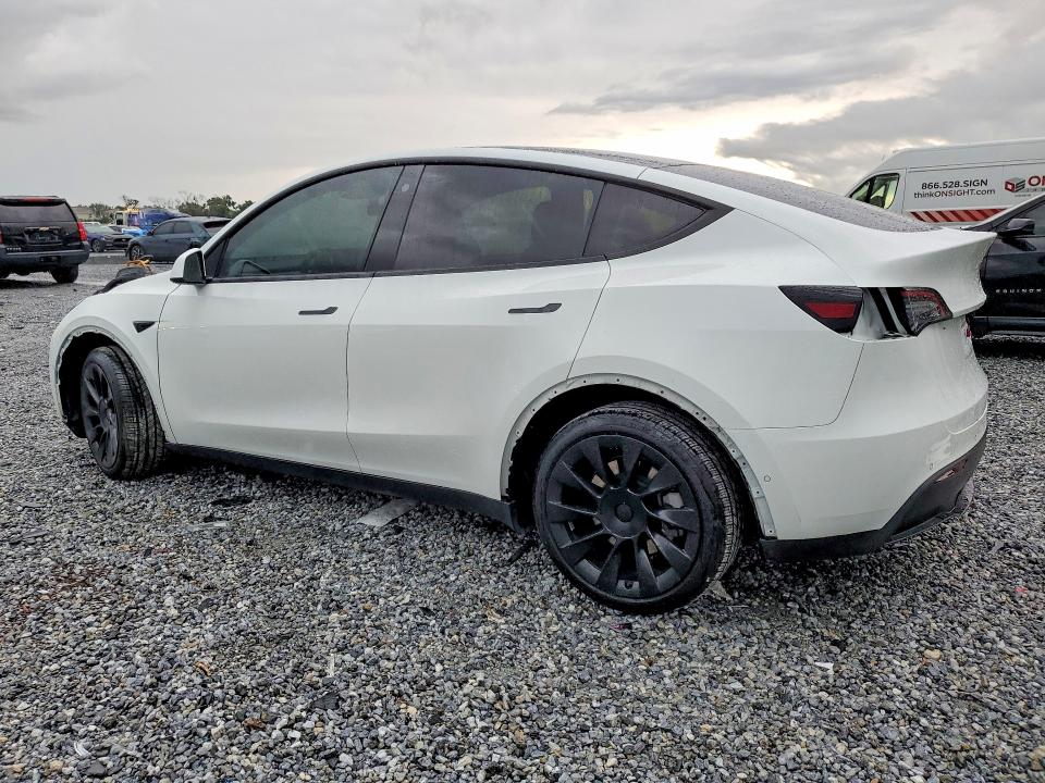 2022 Tesla Model y VIN 7SAYGDEEXNA017150 COPART salvage auction — ALL OVER, FL - CERT OF TITLE SLVG REBUILDABLE, sold $5,500 on 2026-07-24 (photo 2)