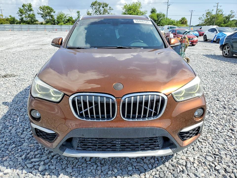 2016 BMW X1 VIN WBXHT3C36GP885519 COPART salvage auction — SIDE, Fl - Cert Of Title Slvg Rebuildable, sold $2,300 on 2026-07-31 (photo 5)