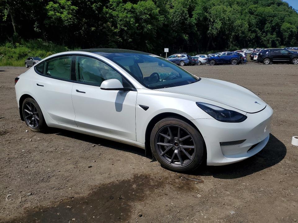 2021 Tesla Model 3 VIN 5YJ3E1EB1MF925215 COPART salvage auction — SIDE, Ny - Mv-907A Salvage Certificate, sold $1,050 on 2026-07-28 (photo 4)