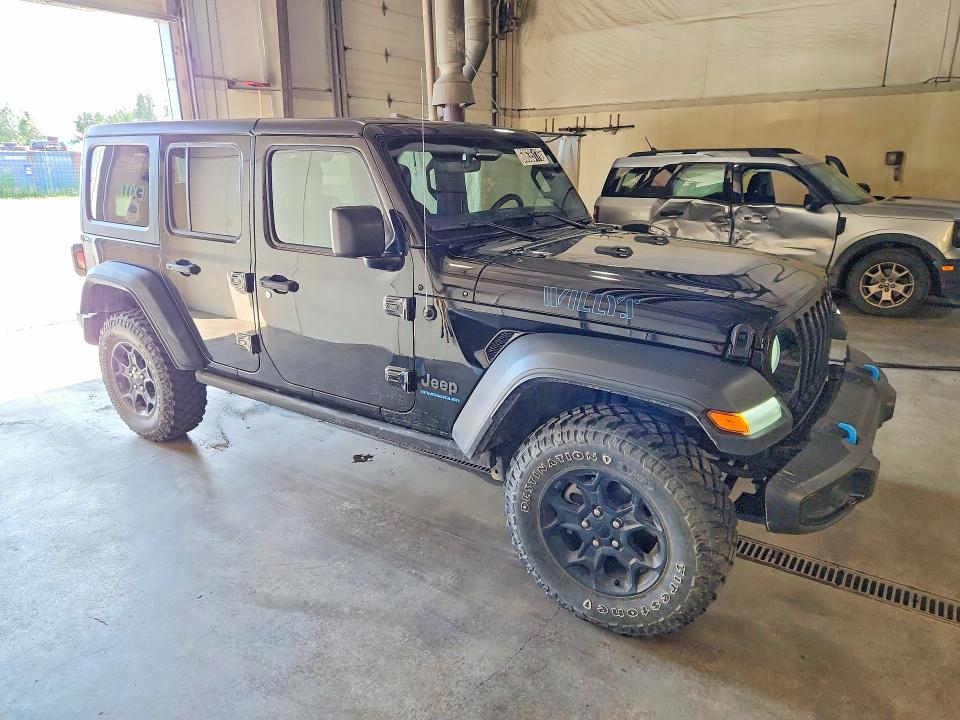 2023 Jeep Wrangler / VIN 1C4JJXN69PW692726 COPART salvage auction — NORMAL WEAR, Ak - Certificate Of Vehicle Title, sold $1,350 on 2026-07-21 (photo 4)