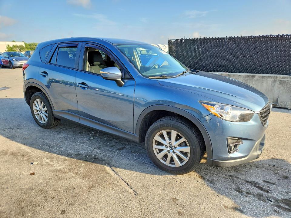 2016 Mazda Cx-5 VIN JM3KE4CY1G0882414 COPART salvage auction — REAR END, Fl - Cert Of Title Slvg Rebuildable, sold $1,400 on 2026-07-28 (photo 4)