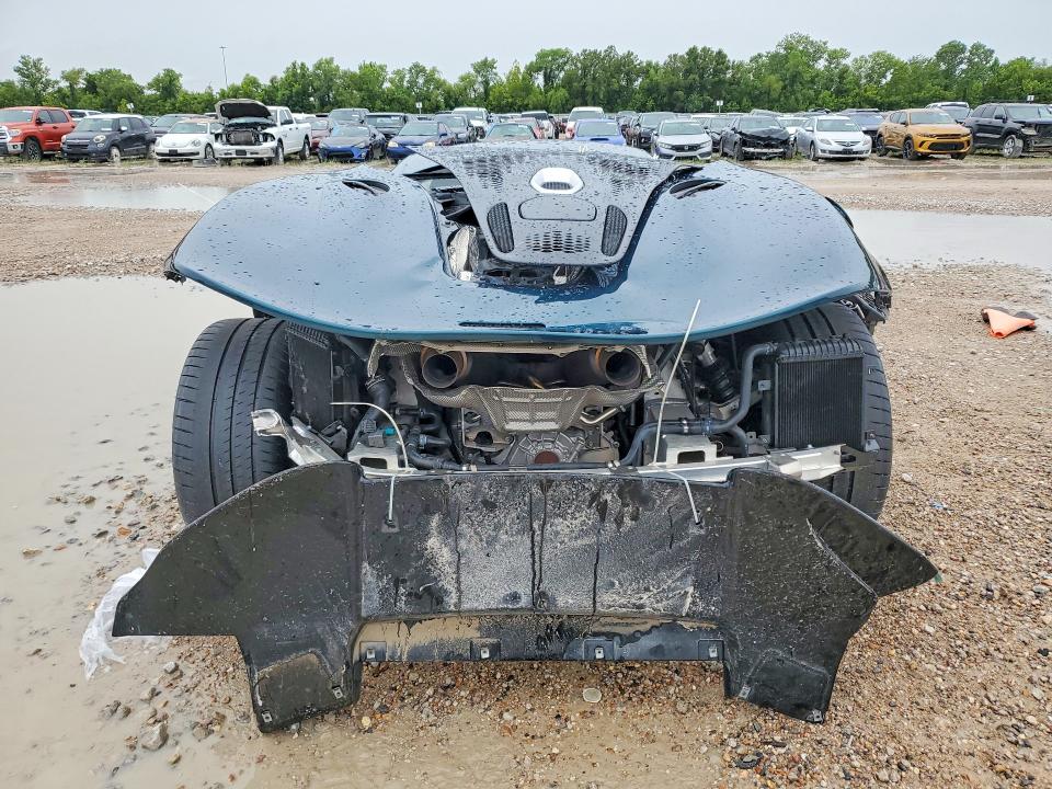 2023 Mclaren automotive Artura VIN SBM16AEA5PW000553 COPART salvage auction — REAR END, TX - SALVAGE VEHICLE TITLE, sold $75,000 on 2026-08-27 (photo 6)