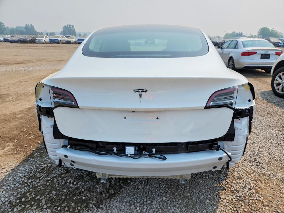 2023 Tesla Model 3 VIN 5YJ3E1EA4PF407014 COPART salvage auction — ALL OVER, ON - PERMIT NO BRAND - UNFIT, sold $3,050 on 2026-07-28 (photo 6)