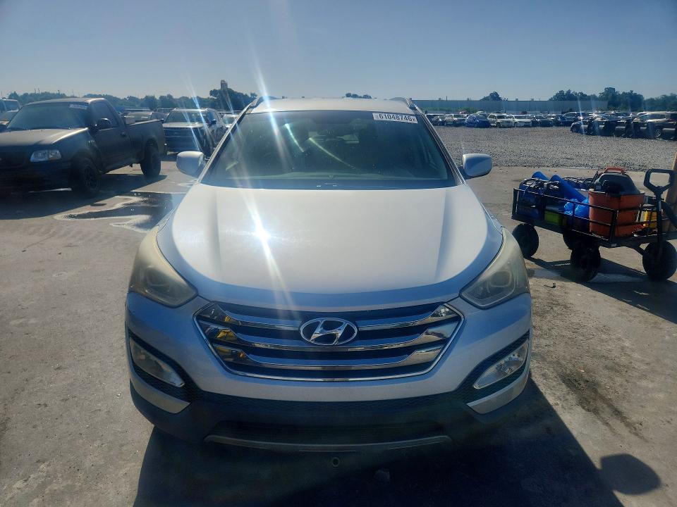 2014 Hyundai Santa fe VIN 5XYZU3LB8EG189301 COPART salvage auction — MECHANICAL, FL - CERTIFICATE OF TITLE, sold $1,800 on 2026-07-20 (photo 5)